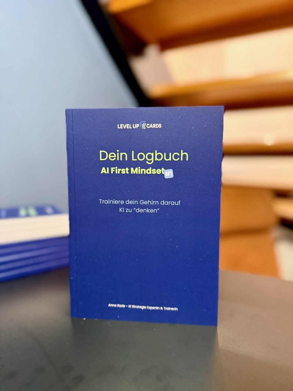 Cover des Level-Up Logbuchs „AI-First Mindset“
